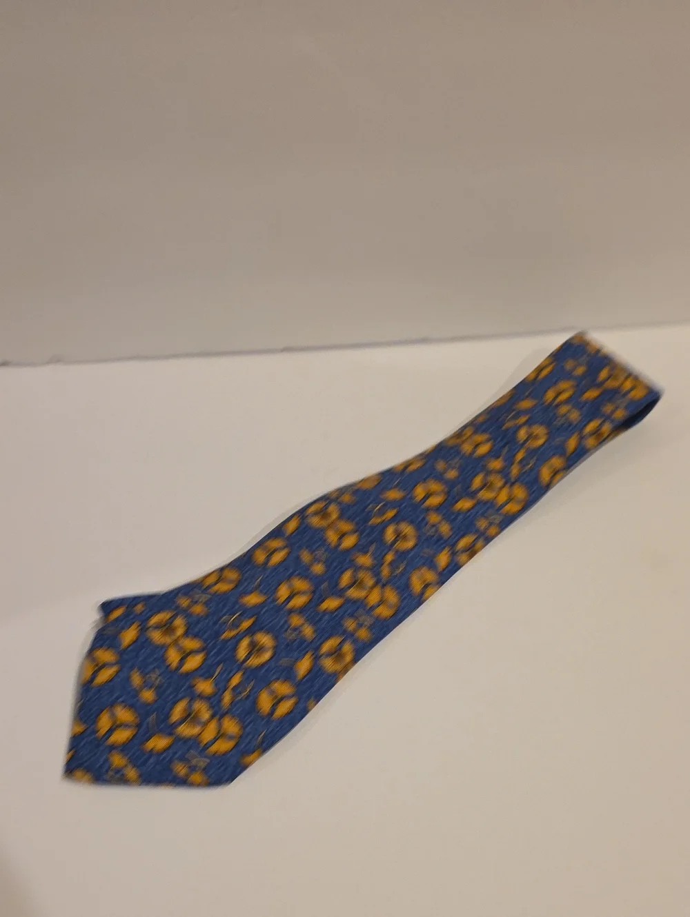 Hermes Flower Tie Silk Made In France Gold And Navy Blue Floral Pattern Authenti